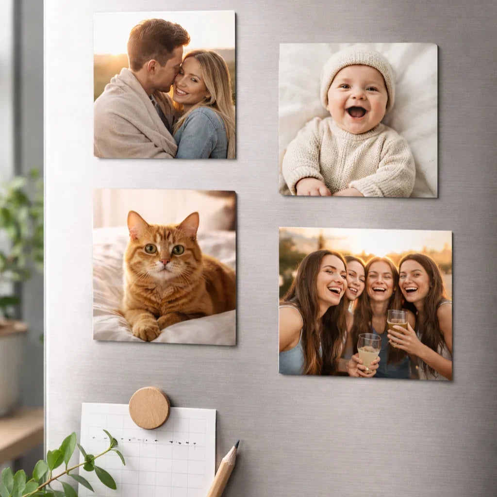 Personalized square photo magnets on a fridge featuring family, friends, baby, and cat photos