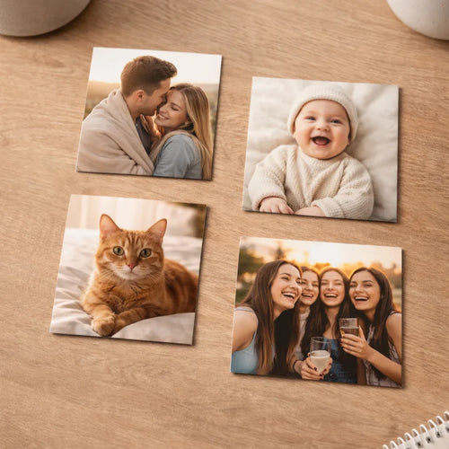 Set of four personalized photo magnets featuring a couple, baby, cat, and group of friends